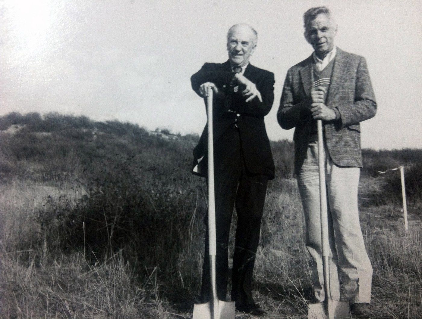 Two men breaking ground with shovels at the original Callaway Vineyard site